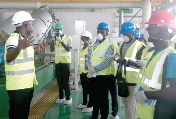 A section of the media being briefed by officials from the faecal treatment plant A section of the media being briefed by officials from the faecal treatment plant